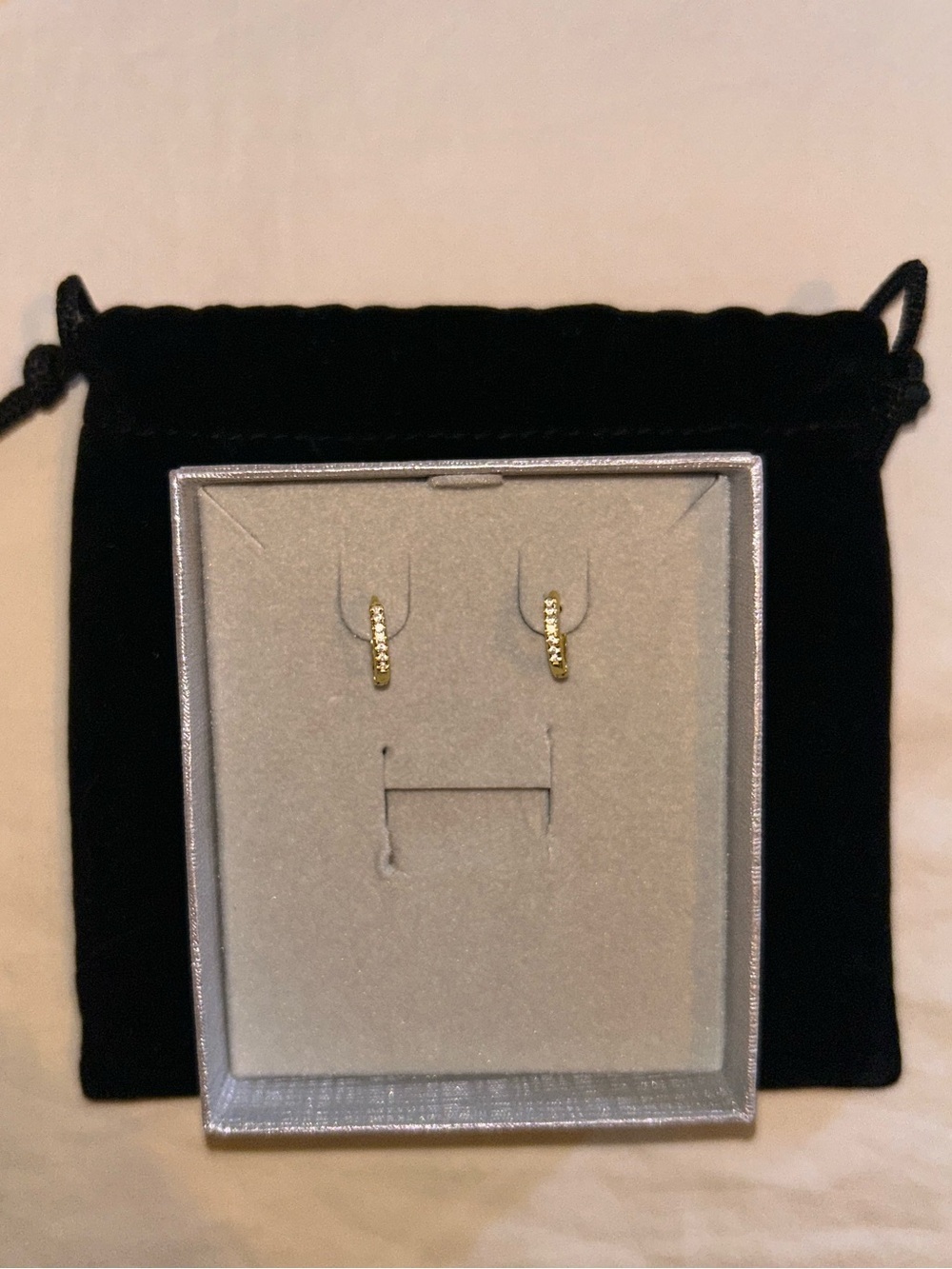 Women’s 14k gold hoops with sapphires
